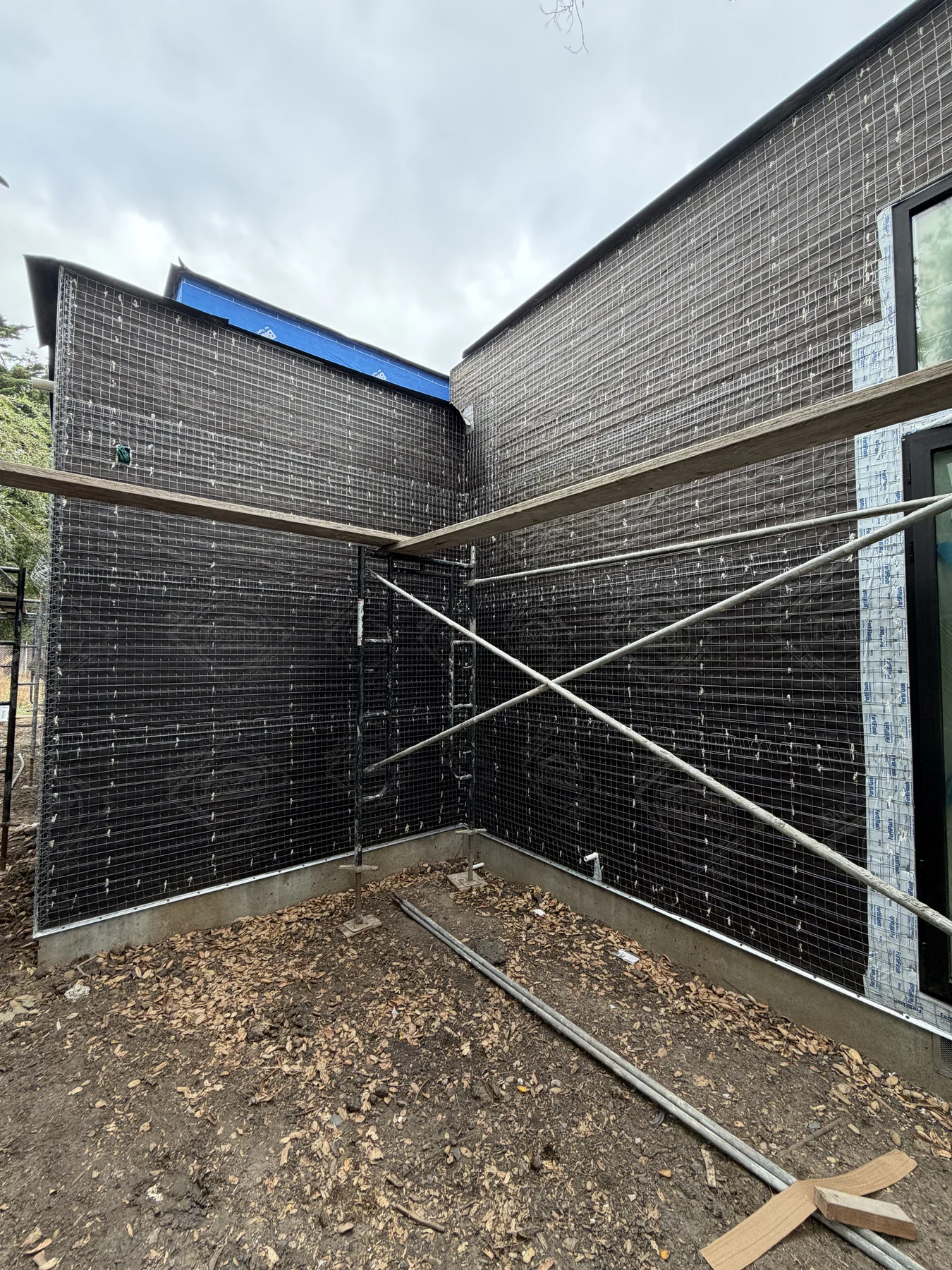 Wire lath installed around a modern exterior in Menlo Park